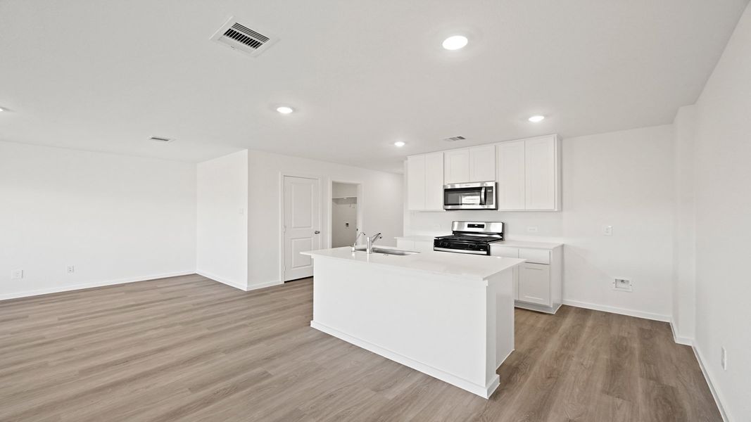 Furnished interior view inside a new home in Westward Pointe, Sealy (Image 7).