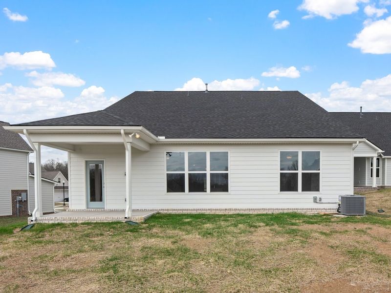 Exterior details and patio area of a home in Woods Crossing, Gallatin (Image 32).