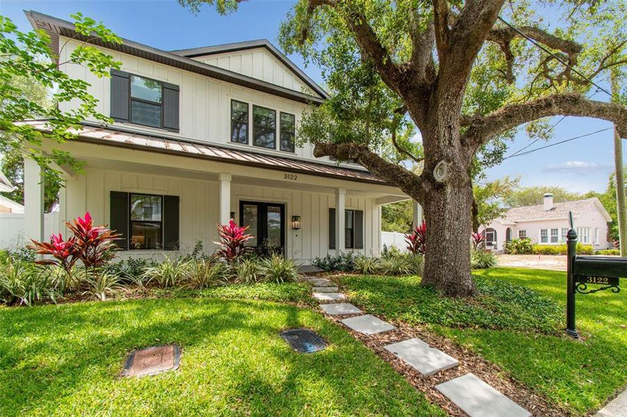 Front exterior of a new home in , Tampa, FL, highlighting curb appeal (Image 28).