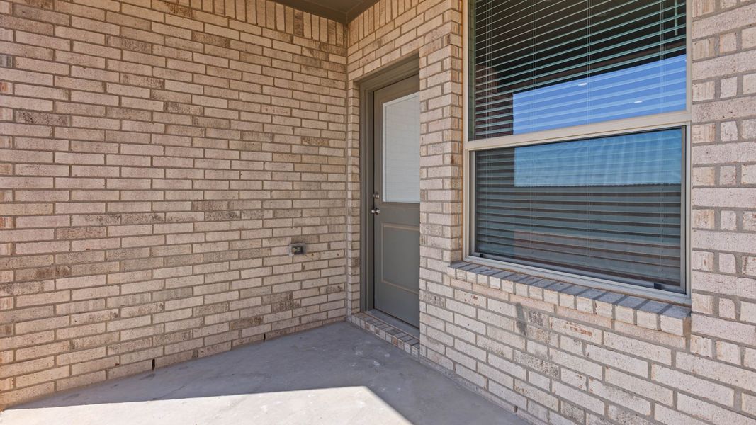 Representative exterior photo of a completed home built from the REDROCK by D.R. Horton in Northwest Passage, Midland, TX (Image 17). Representative exterior photo of a completed home built from the REDROCK by D.R. Horton in Northwest Passage, Midland, TX (Image 17).