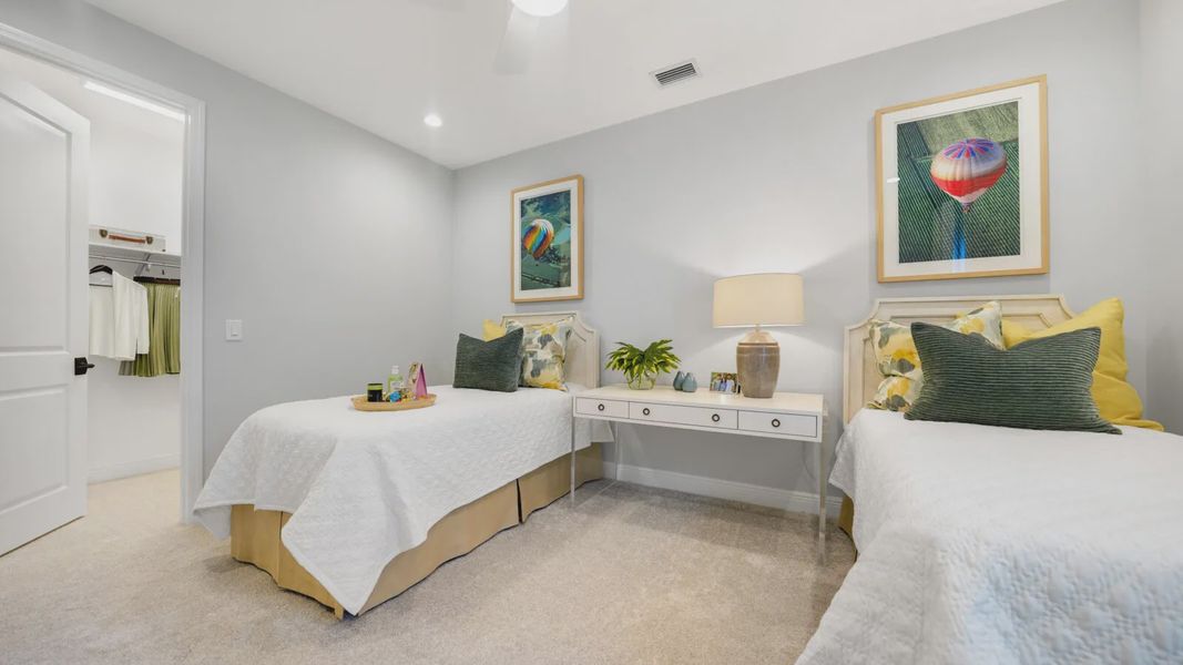 Representative furnished interior of a home built from the Meadow Brook by Neal Communities in SkySail, Naples (Image 5).