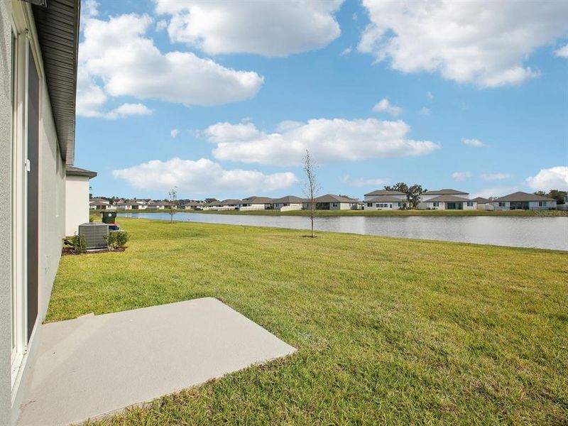 Exterior details and patio area of a home in The Grove at Stuart Crossing - Classic Series, Bartow (Image 2).