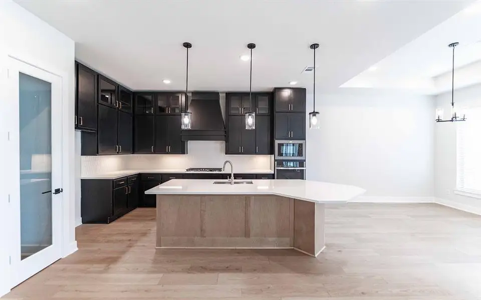 Furnished interior view inside a new home in Heath Golf & Yacht Club, Forney (Image 9).