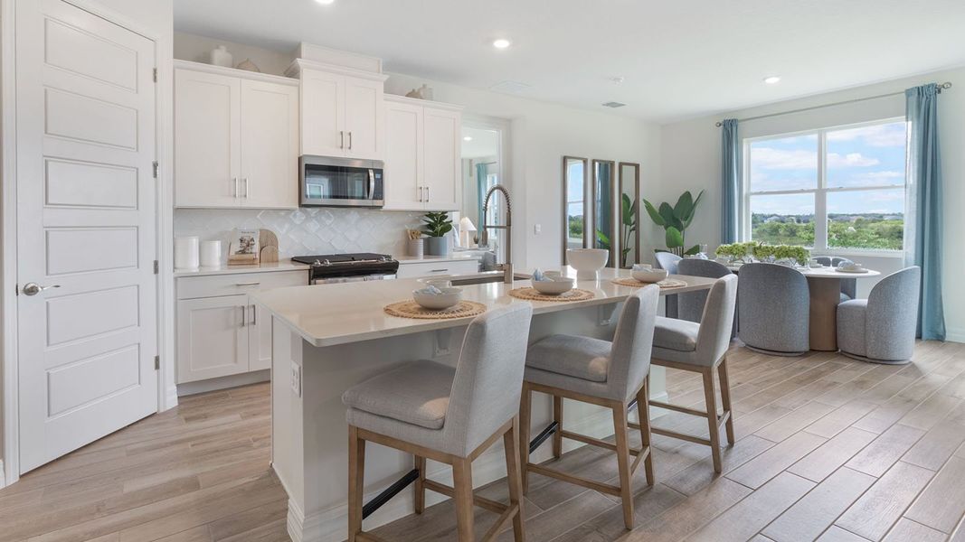 Representative furnished interior of a home built from the DENHAM by D.R. Horton in Lakes of Mount Dora, Mount Dora (Image 15).