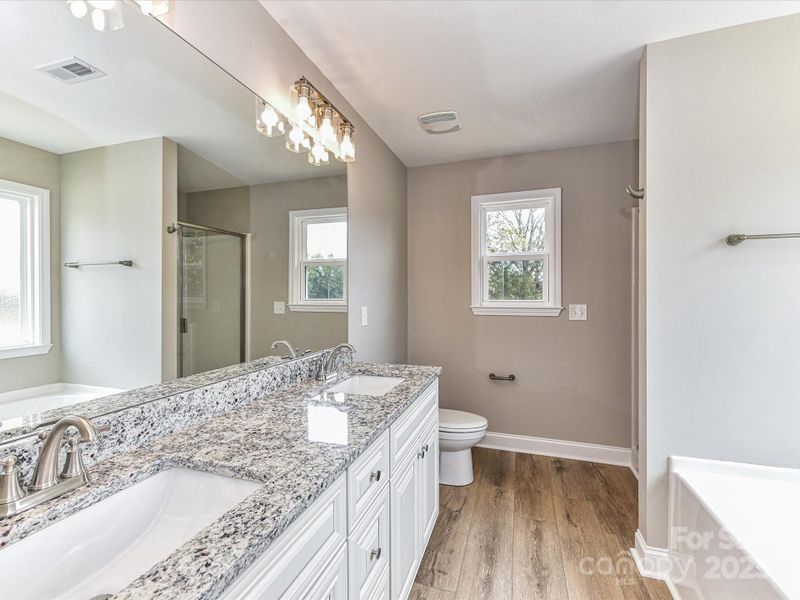 Furnished interior view inside a new home in , Oakboro (Image 8).