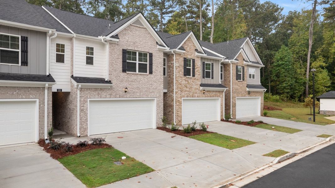 Representative exterior photo of a completed home built from the SALISBURY Express (23'8" wide) by D.R. Horton in Independence Villas and Townhomes, Loganville, GA (Image 2). Representative exterior photo of a completed home built from the SALISBURY Express (23'8" wide) by D.R. Horton in Independence Villas and Townhomes, Loganville, GA (Image 2).