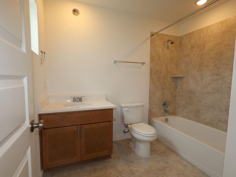 Furnished interior view inside a new home in Heritage, Dripping Springs (Image 4).