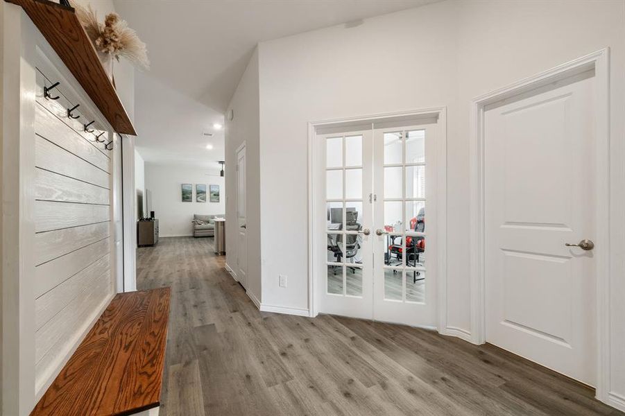 Mudroom with french doors and light wood-type flooring Mudroom with french doors and light wood-type flooring