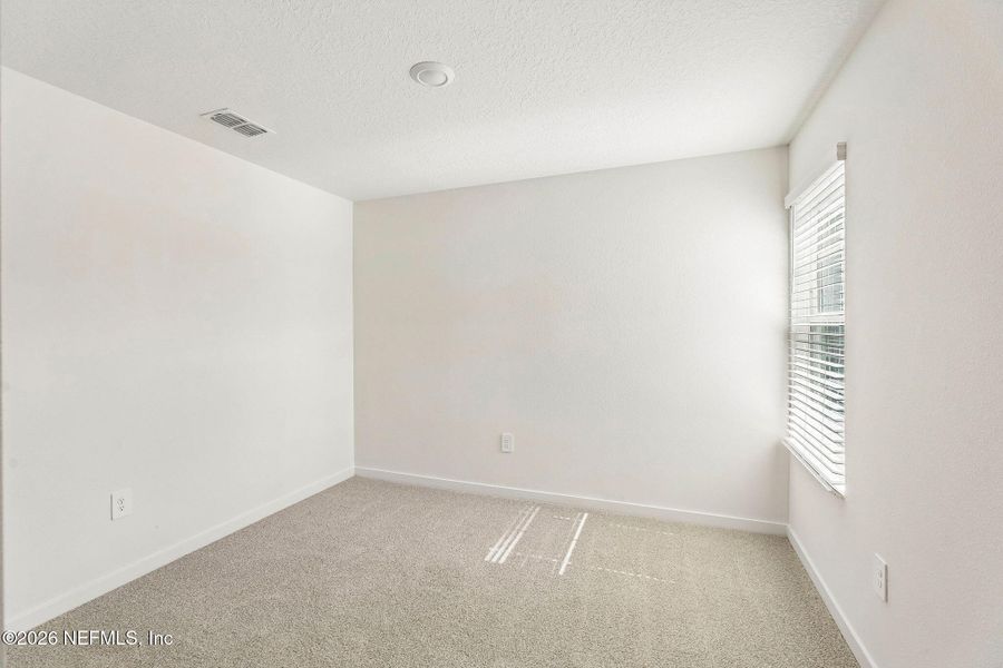Spacious, unfurnished interior of a new home in The District at Oakleaf - The Grove, Middleburg (Image 15).