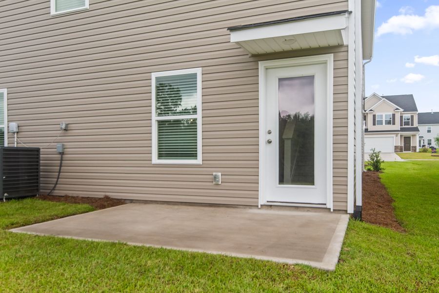 Exterior details and patio area of a home in Victorywoods Village, Columbia (Image 3).