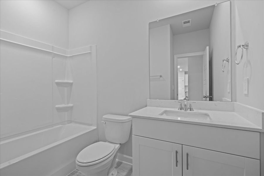 Furnished interior view inside a new home in Chatham Forest, Duncan (Image 6).