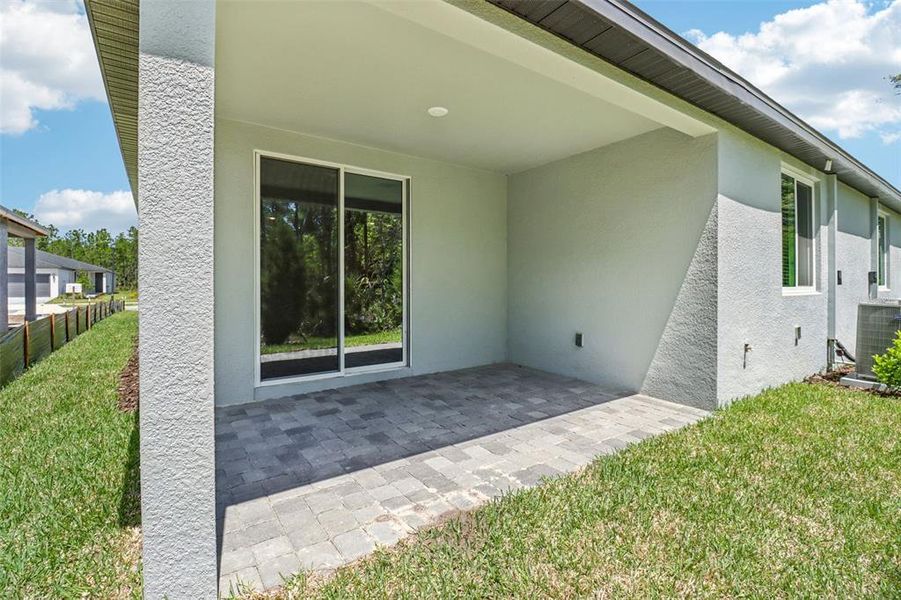 Exterior details and patio area of a home in Ridgehaven - Villas, Ormond Beach (Image 21).