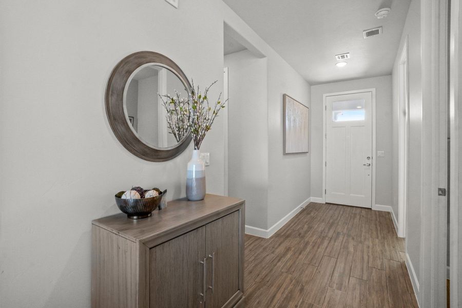 Representative furnished interior of a home built from the Capitan by Hakes Brothers in Hillside Park, El Paso (Image 12).
