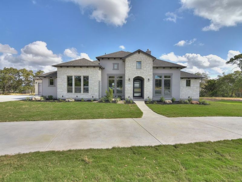 Front exterior of a home in the Leander Estates community, located in Leander, TX (Image 8).