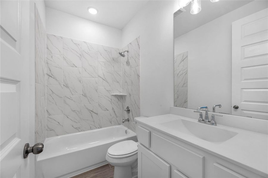 Furnished interior view inside a new home in Sunterra, Katy (Image 8).