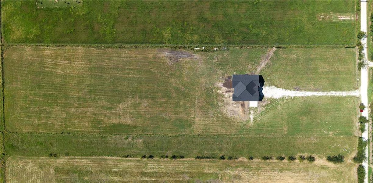 Aerial view of property's location featuring rural landscape