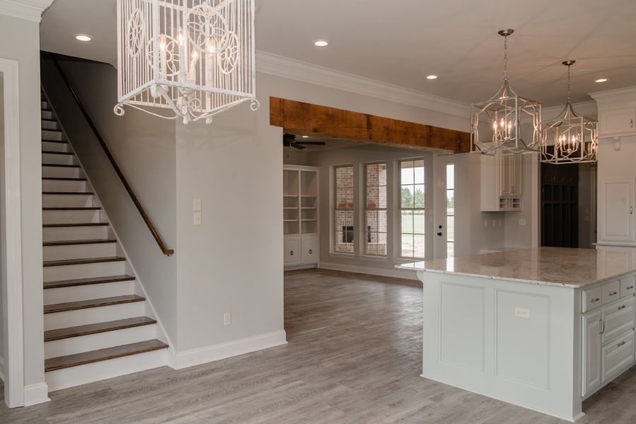 Representative furnished interior of a home built from the The Chateau French by Manuel Builders in Chapel Bend, Montgomery (Image 10).