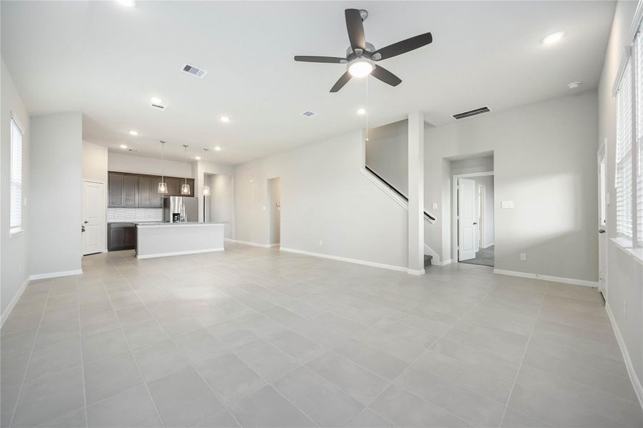 Spacious, unfurnished interior of a new home in Sunterra, Katy (Image 13).