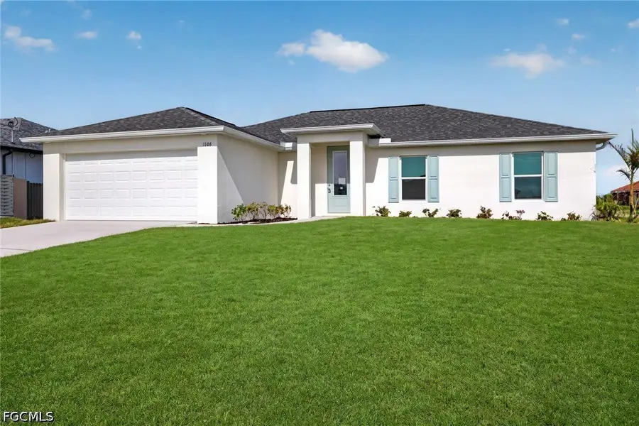 Front exterior of a new home in Cape Coral, Cape Coral, FL, highlighting curb appeal (Image 2). Front exterior of a new home in Cape Coral, Cape Coral, FL, highlighting curb appeal (Image 2).