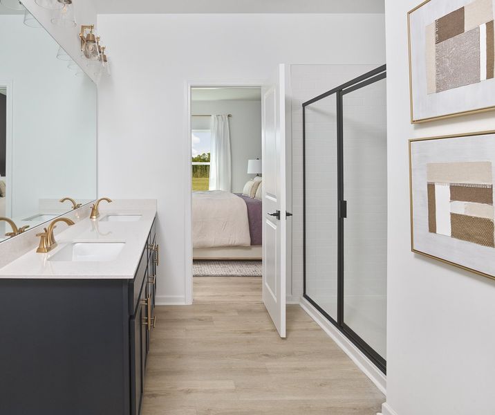 Representative furnished interior of a home built from the Macon by Ashton Woods in Rowland's Grant, Fuquay Varina (Image 11).