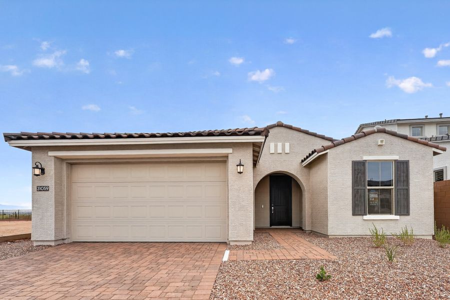 Front exterior of a new home in Ladera Trails, Queen Creek, AZ, highlighting curb appeal (Image 1). Front exterior of a new home in Ladera Trails, Queen Creek, AZ, highlighting curb appeal (Image 1).