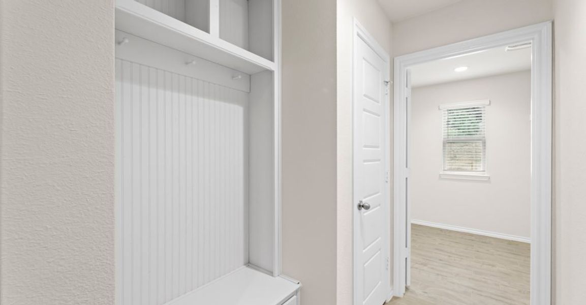 Representative exterior photo of a completed home built from the Austin by Impression Homes in Keeneland, Aubrey, TX (Image 12).