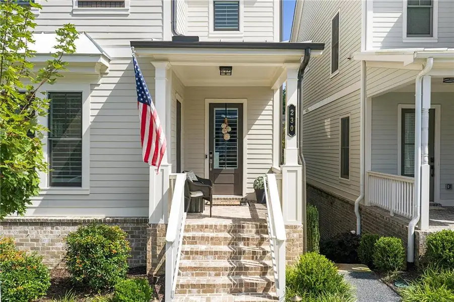 Exterior details and patio area of a home in Manning on the Square, Alpharetta (Image 3).