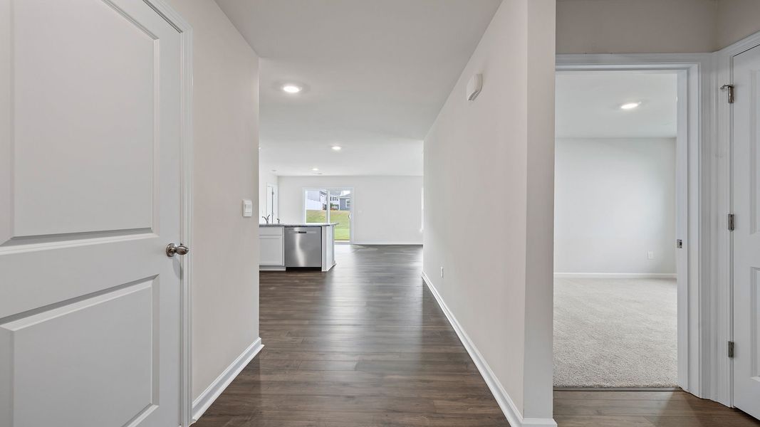 Spacious, unfurnished interior of a new home in Bentley Park, Greenwood (Image 14).
