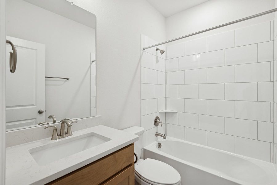 Furnished interior view inside a new home in Pomona - Reserve Collection, Manvel (Image 15).