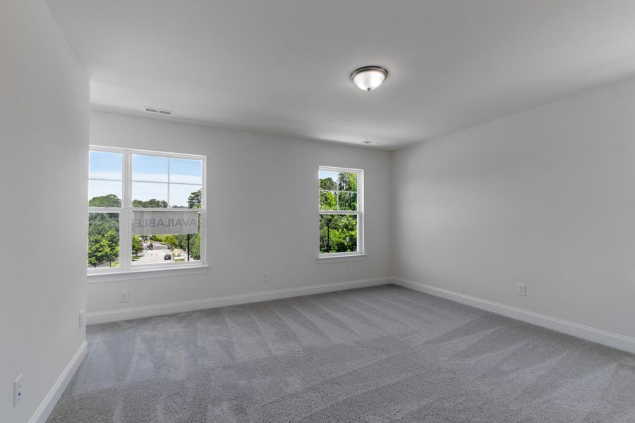 Spacious, unfurnished interior of a new home in Enclave at Traditions Townhomes, Wake Forest (Image 19).