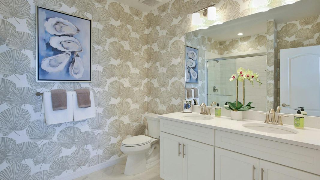 Furnished interior view inside a new home in Palm Grove Real Estate and Homes for Sale in Lakewood Ranch, FL - Neal Communities, Lakewood Ranch (Image 20).