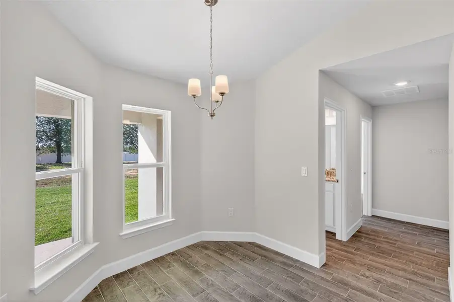 Spacious, unfurnished interior of a new home in Hill Country Estates, Dade City (Image 20).