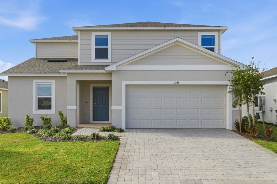 Representative exterior photo of a completed home built from the Azalea by Taylor Morrison in Waterstone, Groveland, FL (Image 2). Representative exterior photo of a completed home built from the Azalea by Taylor Morrison in Waterstone, Groveland, FL (Image 2).