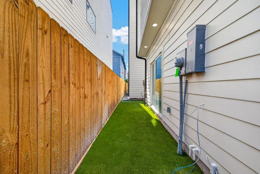 Exterior details and patio area of a home in , Houston (Image 24).