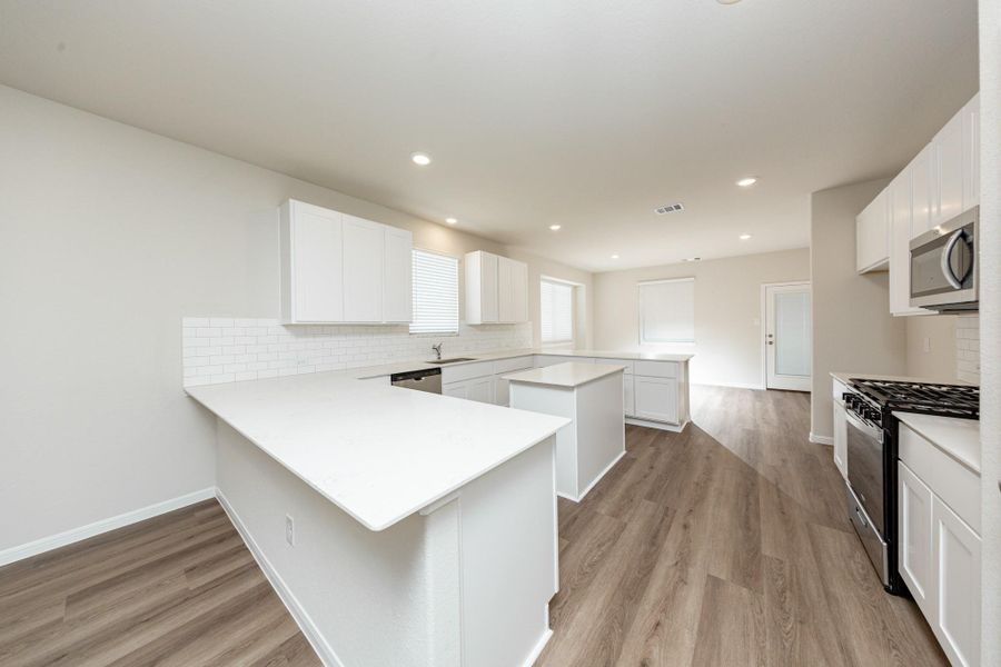 Furnished interior view inside a new home in River's Edge, Conroe (Image 6).