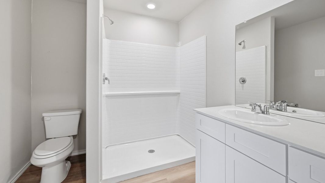 Representative furnished interior of a home built from the Estero by D.R. Horton in Hickory Grove, Krum (Image 12).