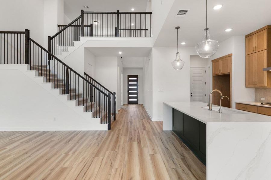 Furnished interior view inside a new home in Heritage, Dripping Springs (Image 7).