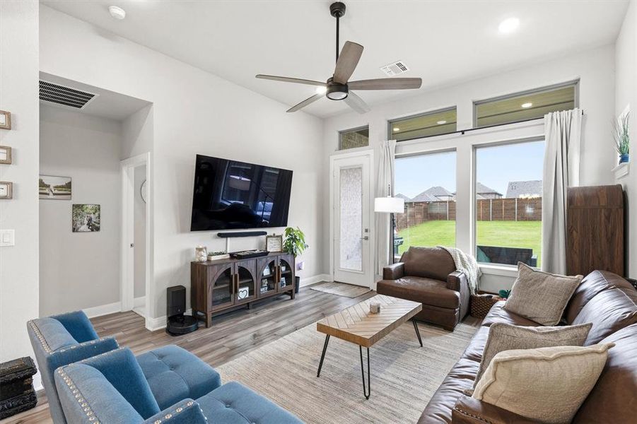Living Room first floor with views to the back covered patio Living Room first floor with views to the back covered patio