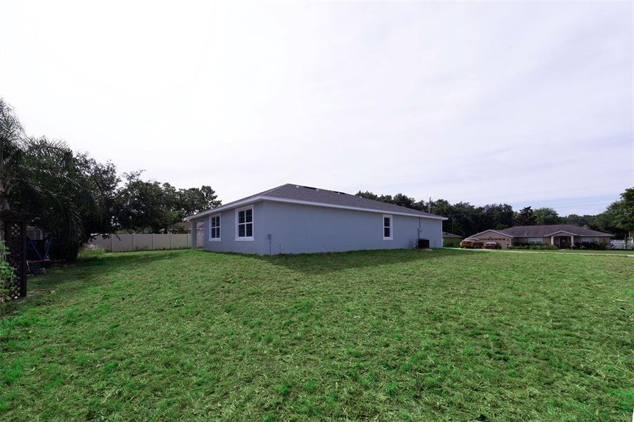 Front exterior of a new home in , Summerfield, FL, highlighting curb appeal (Image 21).