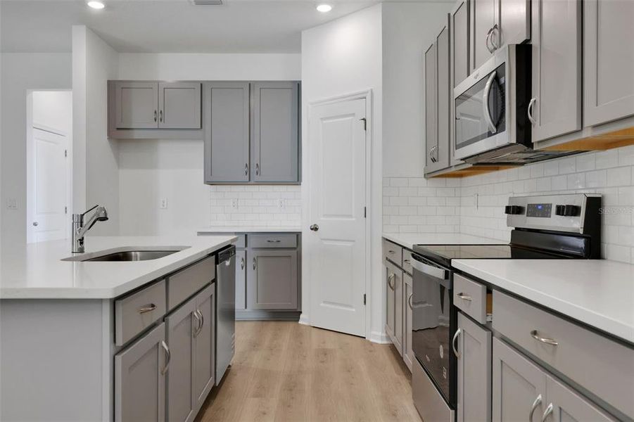 Furnished interior view inside a new home in Seaport Village, Tavares (Image 8).