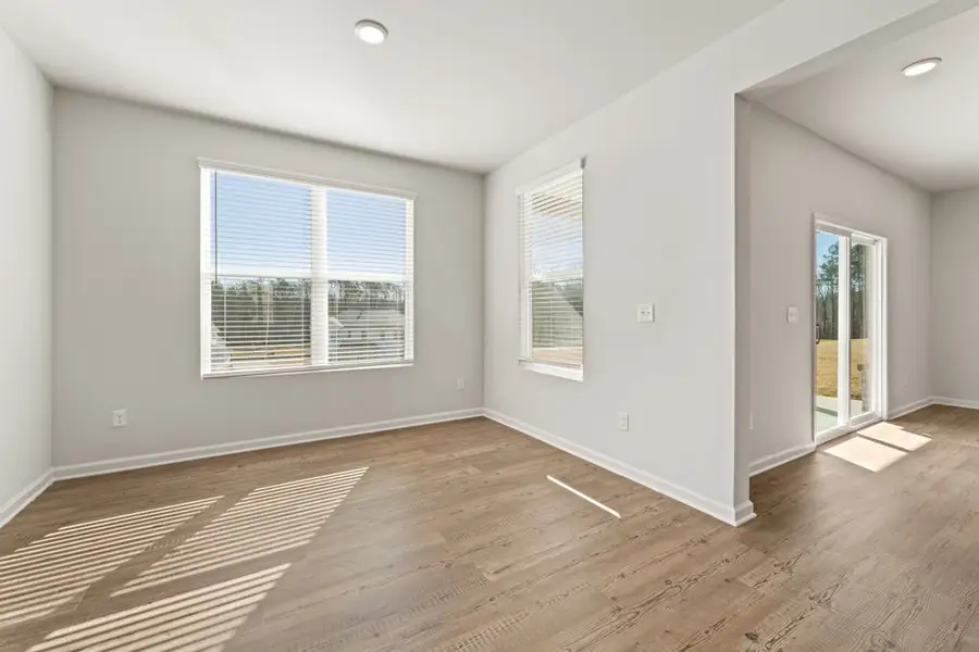 A room with a wood floor and a wood floor. A room with a wood floor and a wood floor.