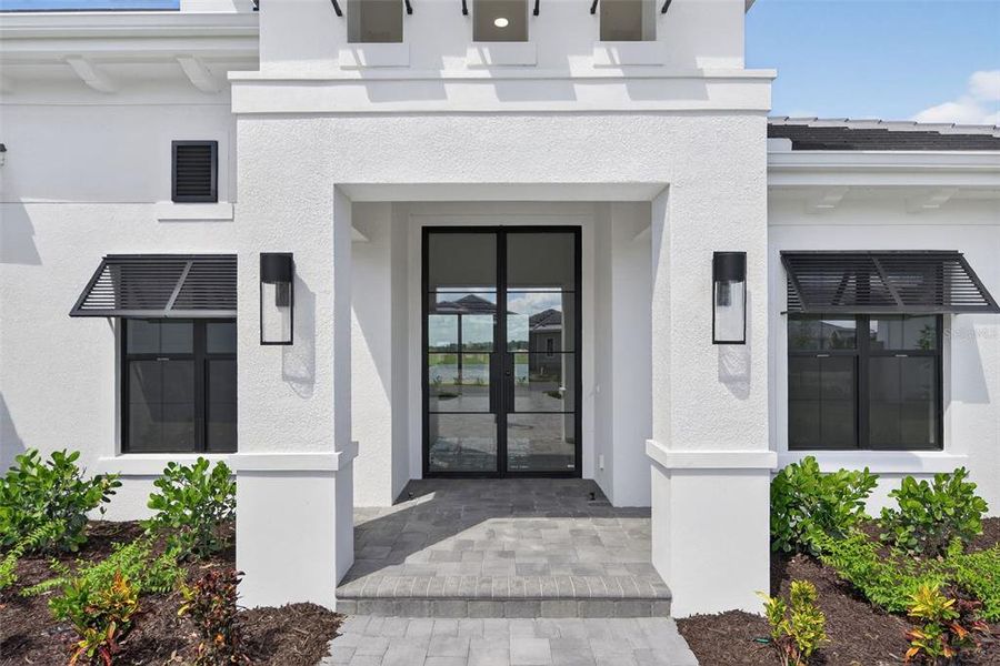 Exterior details and patio area of a home in , Sarasota (Image 25).
