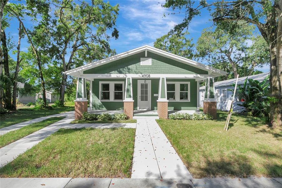 Front exterior of a new home in , Tampa, FL, highlighting curb appeal (Image 1). Front exterior of a new home in , Tampa, FL, highlighting curb appeal (Image 1).