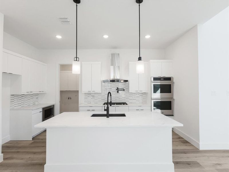 Furnished interior view inside a new home in Royal Court, Little Elm (Image 5).