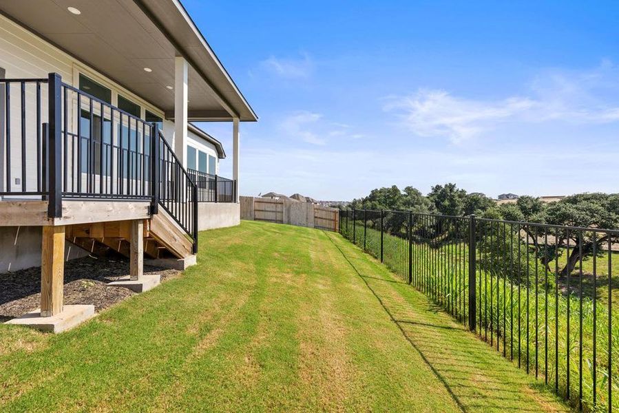 Exterior details and patio area of a home in Lariat, Liberty Hill (Image 28).