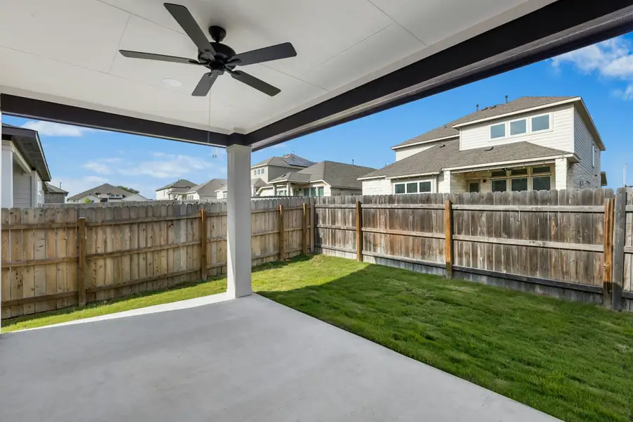 Exterior details and patio area of a home in University Heights, Round Rock (Image 3).