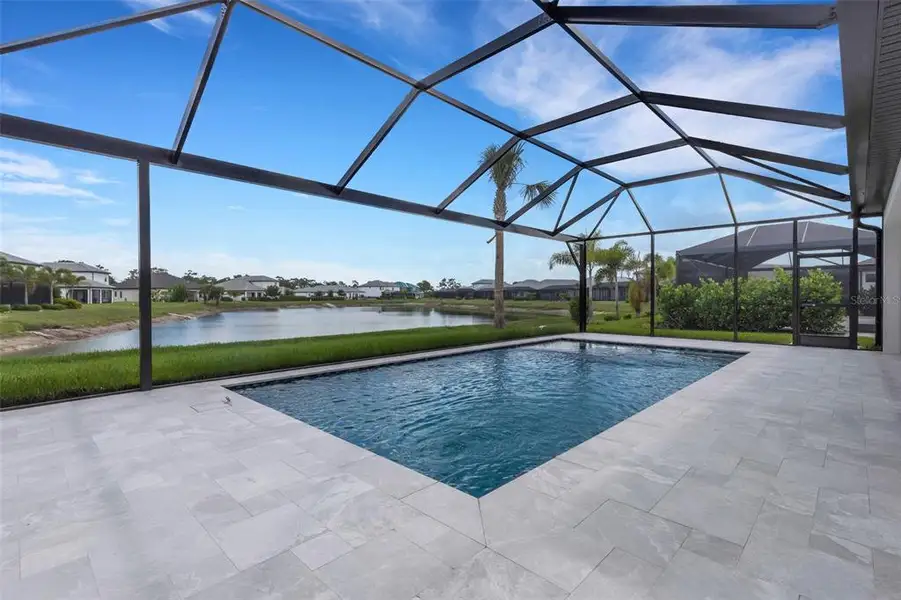 Exterior details and patio area of a home in Cassata Lakes, Nokomis (Image 25).
