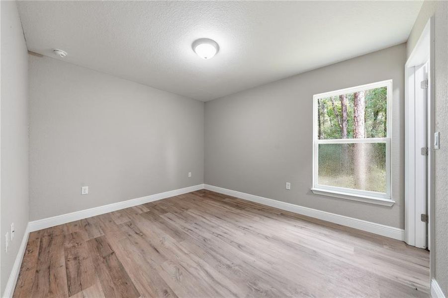 Spacious, unfurnished interior of a new home in , Citrus Springs (Image 40).