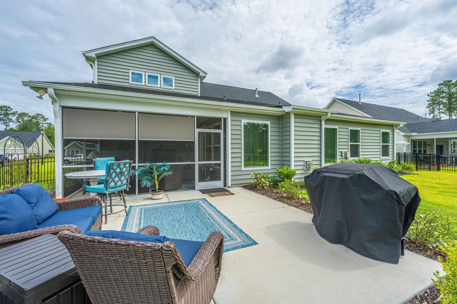 Exterior details and patio area of a home in The Enclave at French Quarter Creek, Huger (Image 31). Exterior details and patio area of a home in The Enclave at French Quarter Creek, Huger (Image 31).
