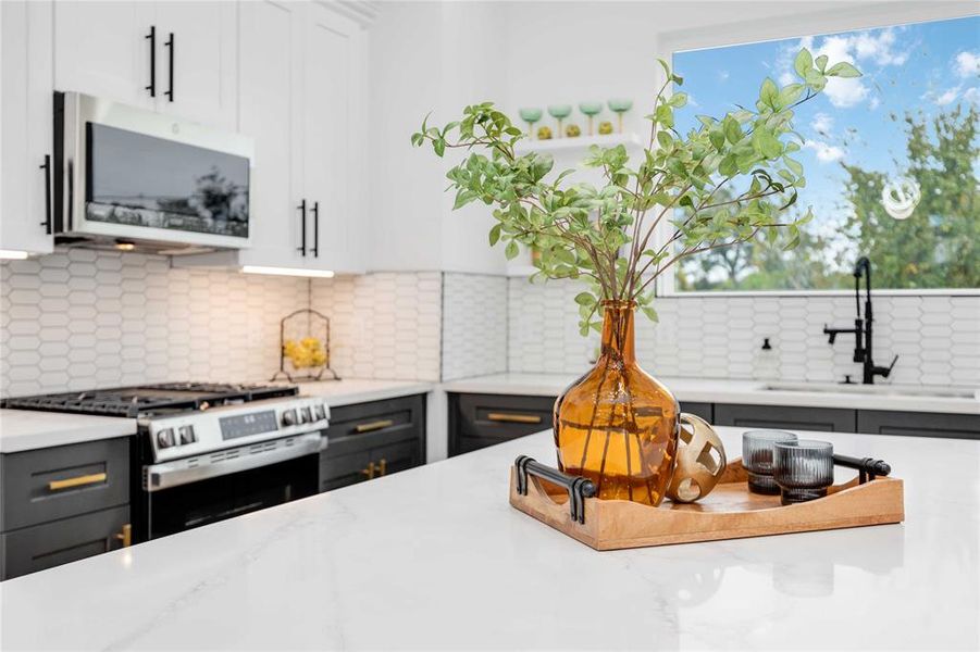 Contemporary, open concept kitchen with high-end finishes